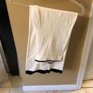 White knit pants with black details